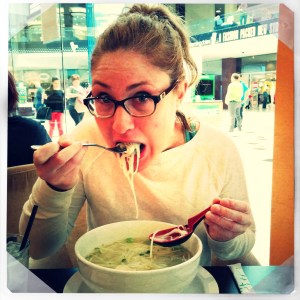 Lacey eating pho